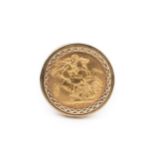 An Elizabeth II sovereign, 1976, in a 9ct gold clip mount ring with textured decoration