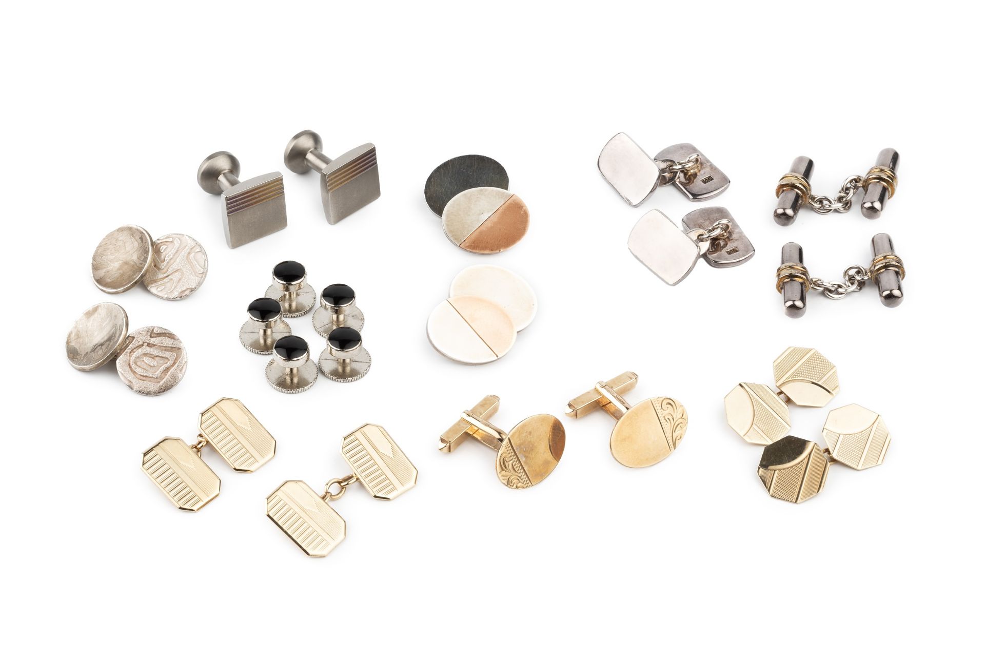 A collection of cufflinks, comprising a 9ct gold pair of solid bar cufflinks, two pairs of 9ct
