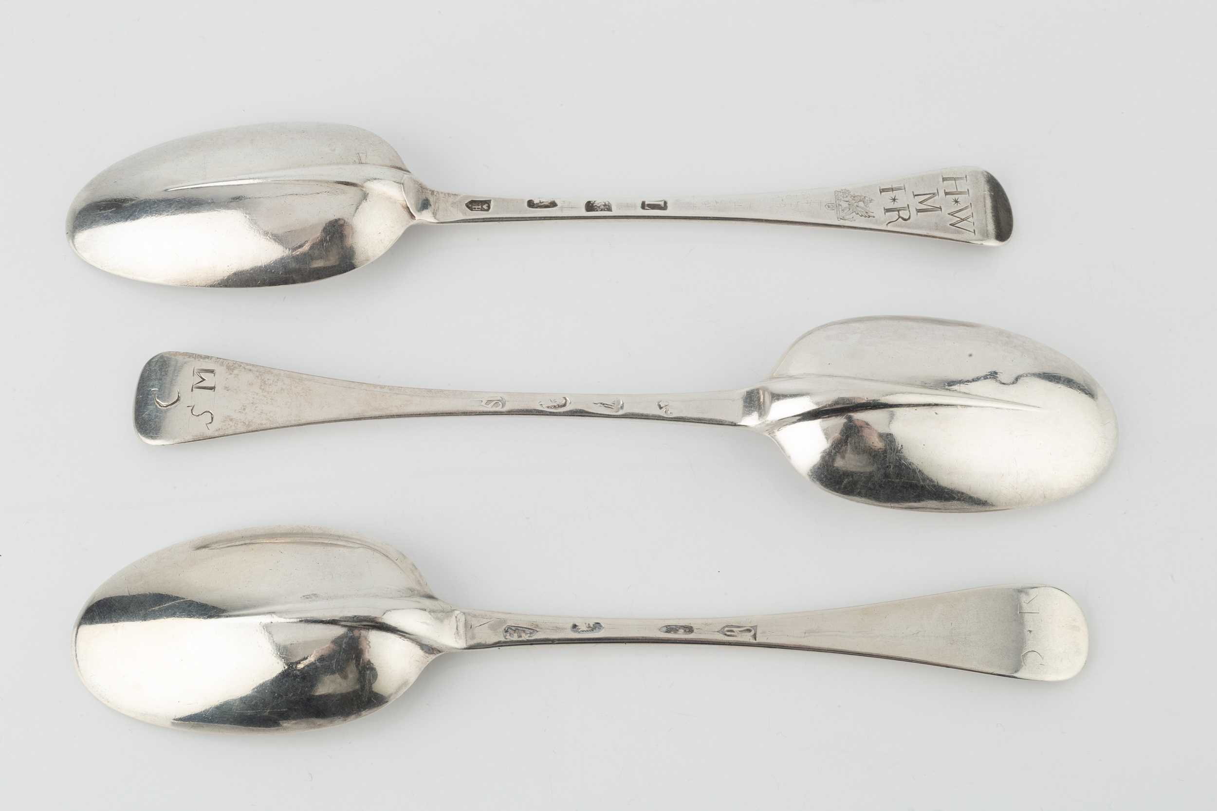 A Queen Anne silver Hanoverian pattern tablespoon, maker's mark indistinct, London 1710, and two - Image 2 of 2