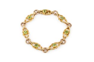 A 15ct gold and peridot bracelet, composed of shaped open ropetwist links, each centred with a round