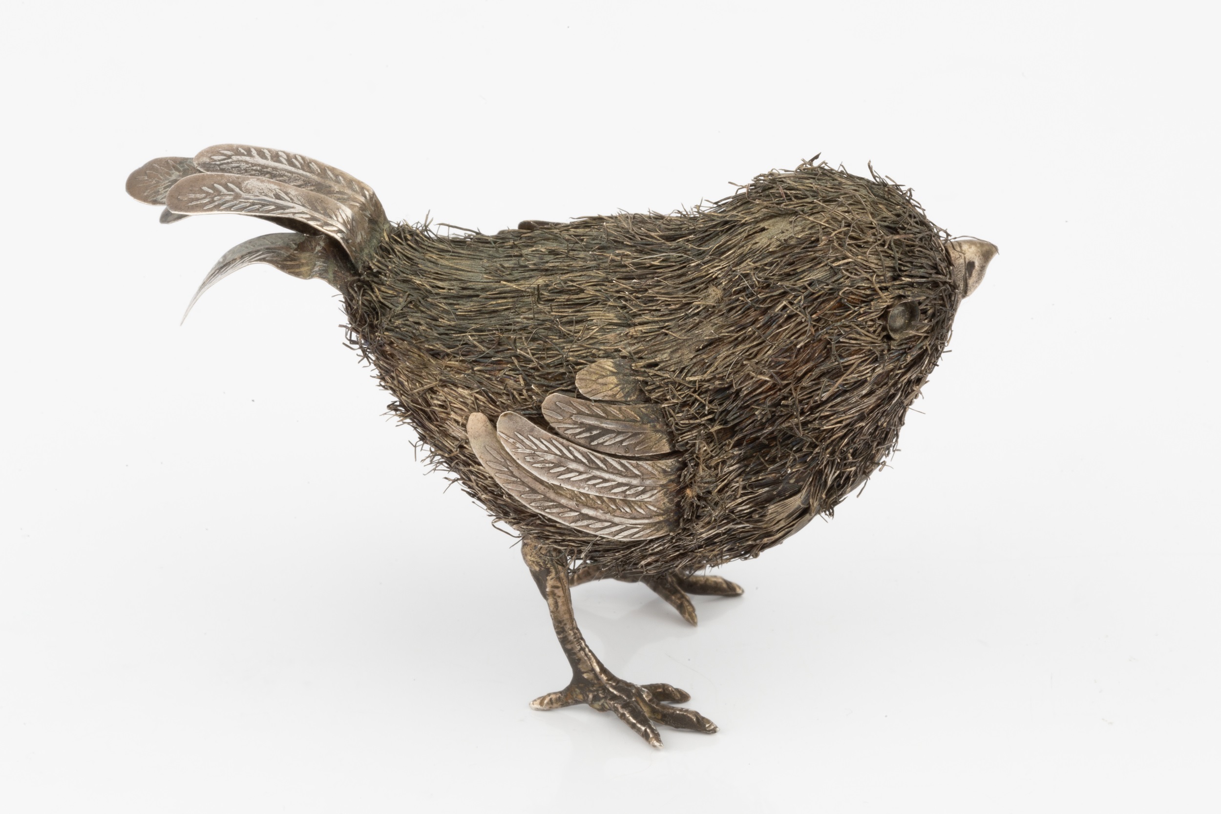 An Italian silver model bird by Mario Buccellati, 5.5cm high Some mis-shapen parts including tail - Image 2 of 2