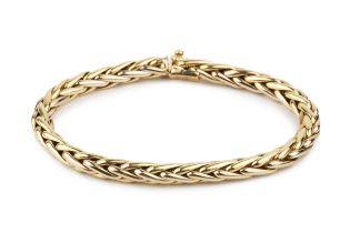 An 18ct gold bracelet, of hollow plaited design, the clasp set with a small cabochon blue stone,