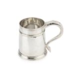 A Queen Anne Britannia standard silver pint mug, with girdled slightly tapering body and scroll