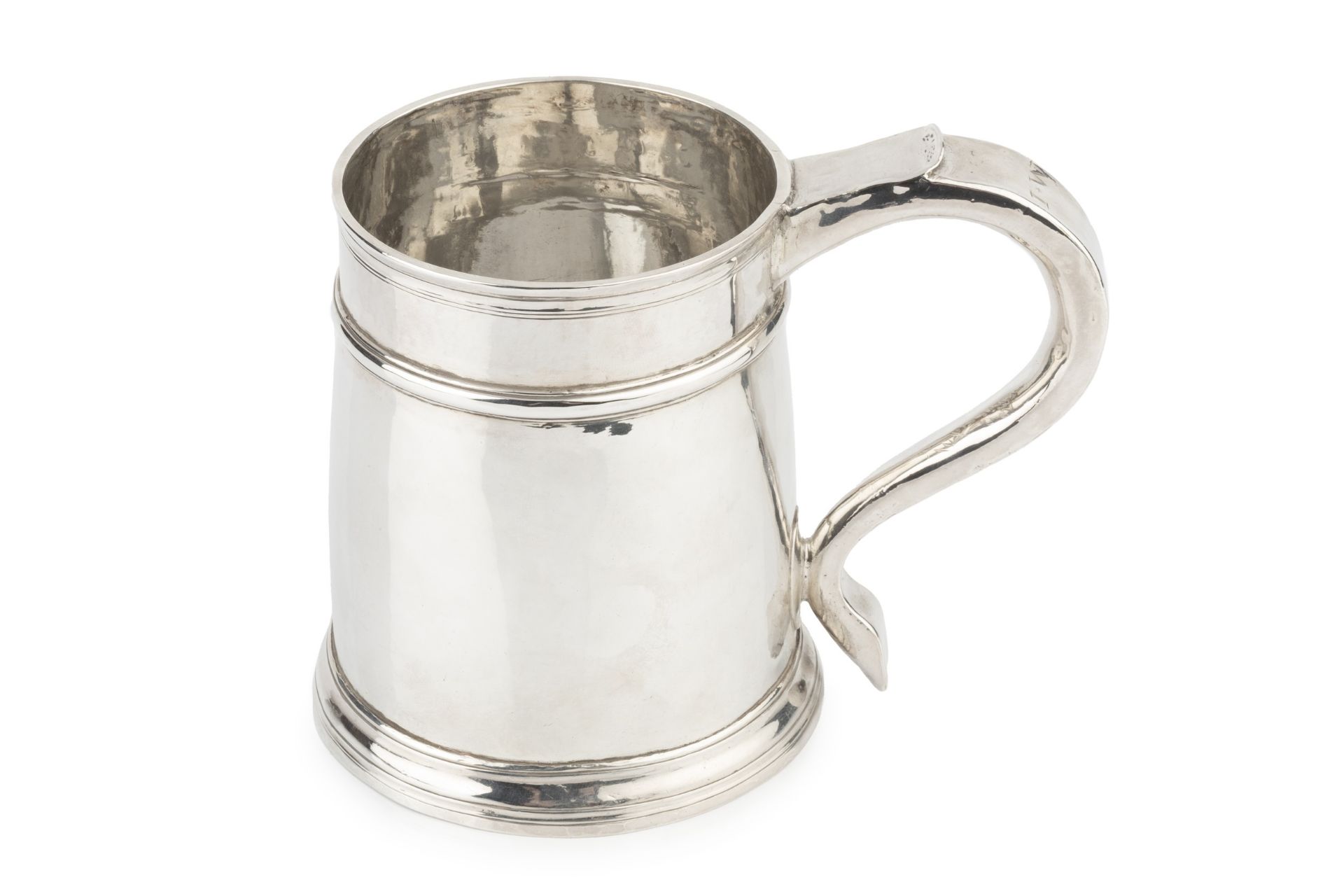 A Queen Anne Britannia standard silver pint mug, with girdled slightly tapering body and scroll