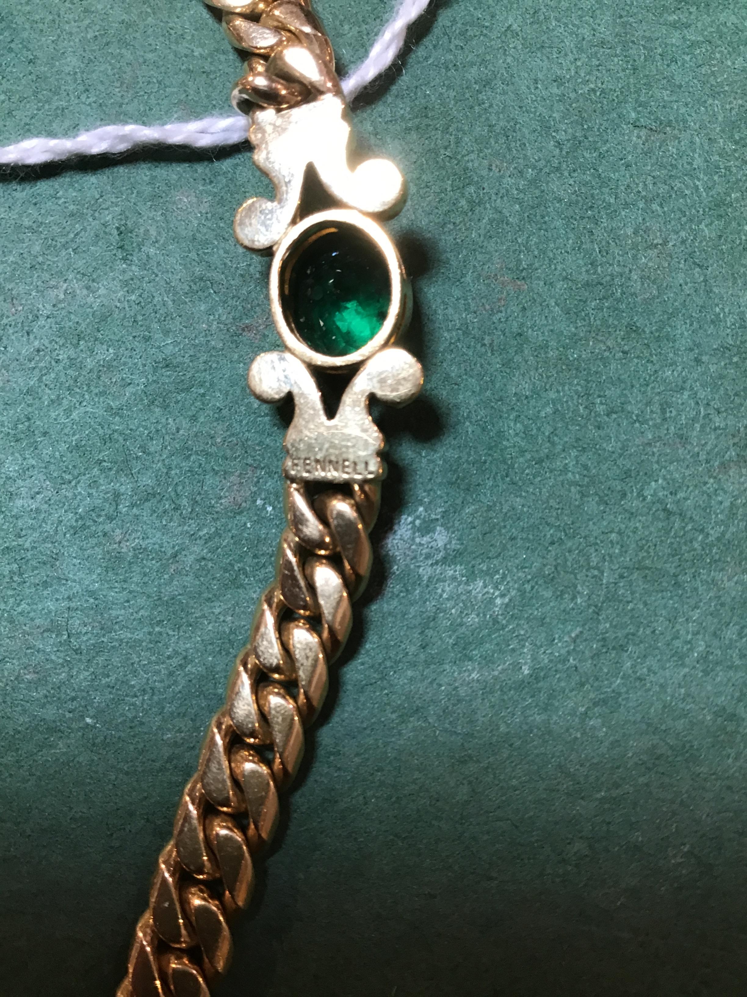 An 18ct gold and emerald necklace by Theo Fennell, of curb link design, with central oval collet-set - Image 3 of 4