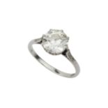 A diamond solitaire ring, the old brilliant cut stone of approx 2.6ct claw set in platinum, with