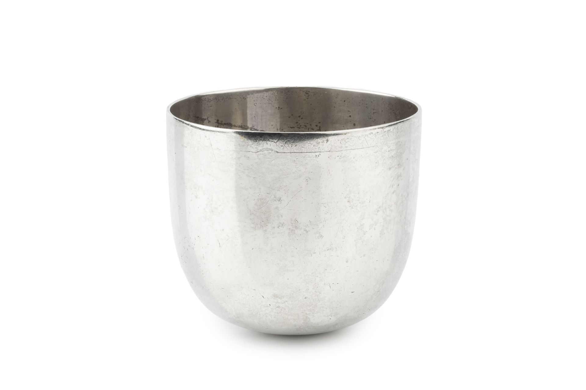 A George V silver tumbler cup, of plain rounded design, maker's mark worn, retailer's mark for