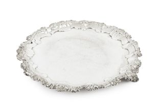 A William IV silver salver, with shaped foliate and scroll decorated border, and engraved decoration