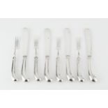 A set of six George V silver dessert knives and forks, with pistol grip handles, by Harrison