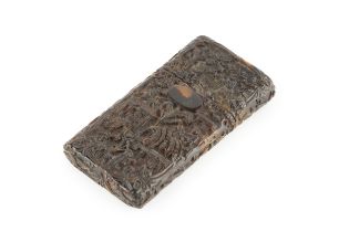 A 19th century Chinese carved tortoiseshell card case, of rounded rectangular form, intricately
