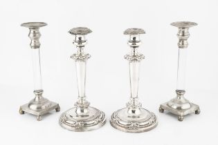 A pair of 19th century silver plated candlesticks, the knopped tapering stems with foliate scroll