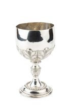 A George III silver goblet, the bowl chased and engraved with stylised leaves, on knopped stem and