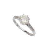 A diamond solitaire ring, the brilliant cut stone of approx 1ct, claw set with scroll-pierced