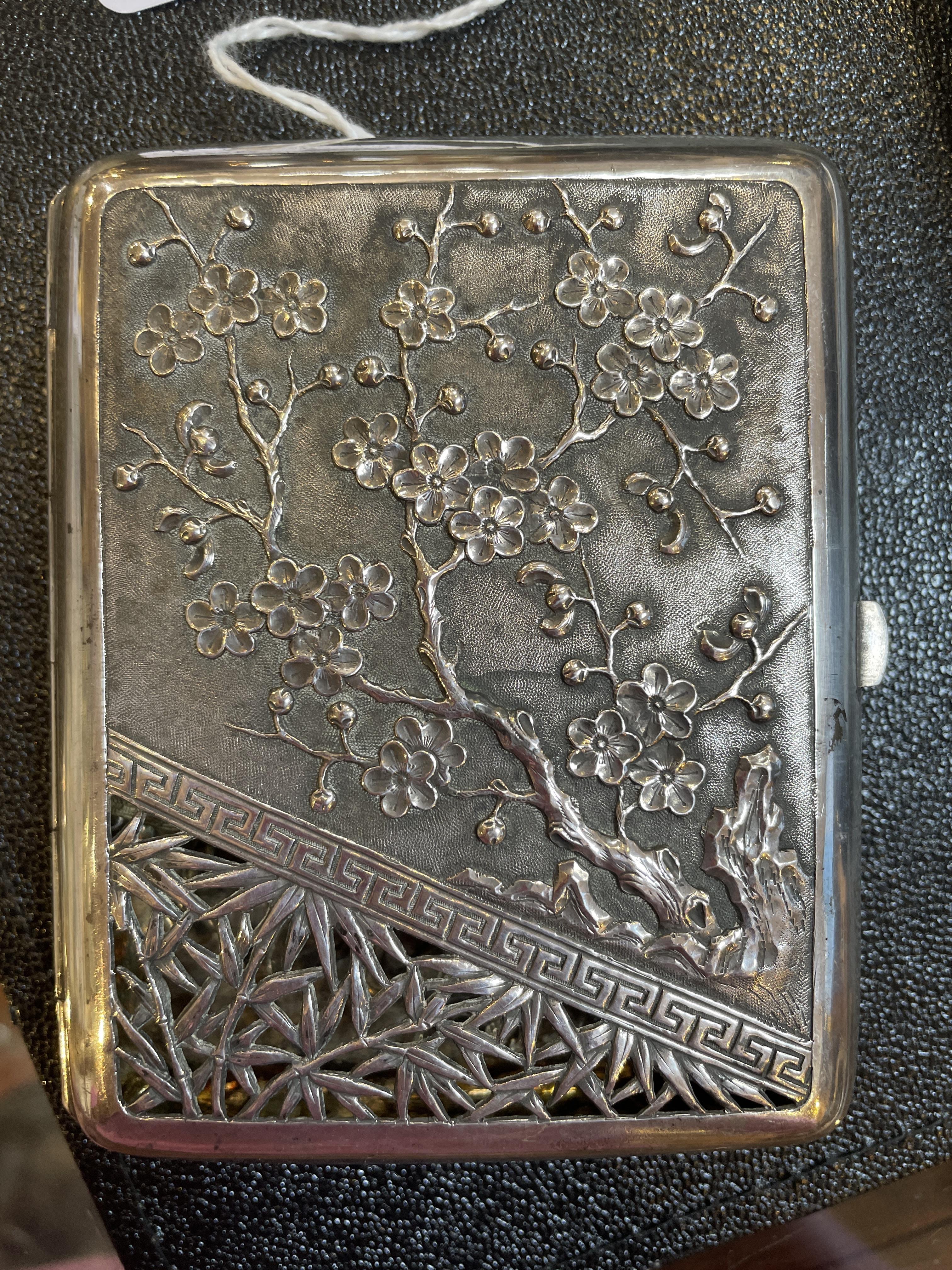 A late 19th century Chinese export silver cigarette case, with embossed and pierced decoration to - Image 11 of 13