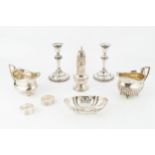 A collection of silver, comprising a George III half-lobed milk jug, London 1809, another milk