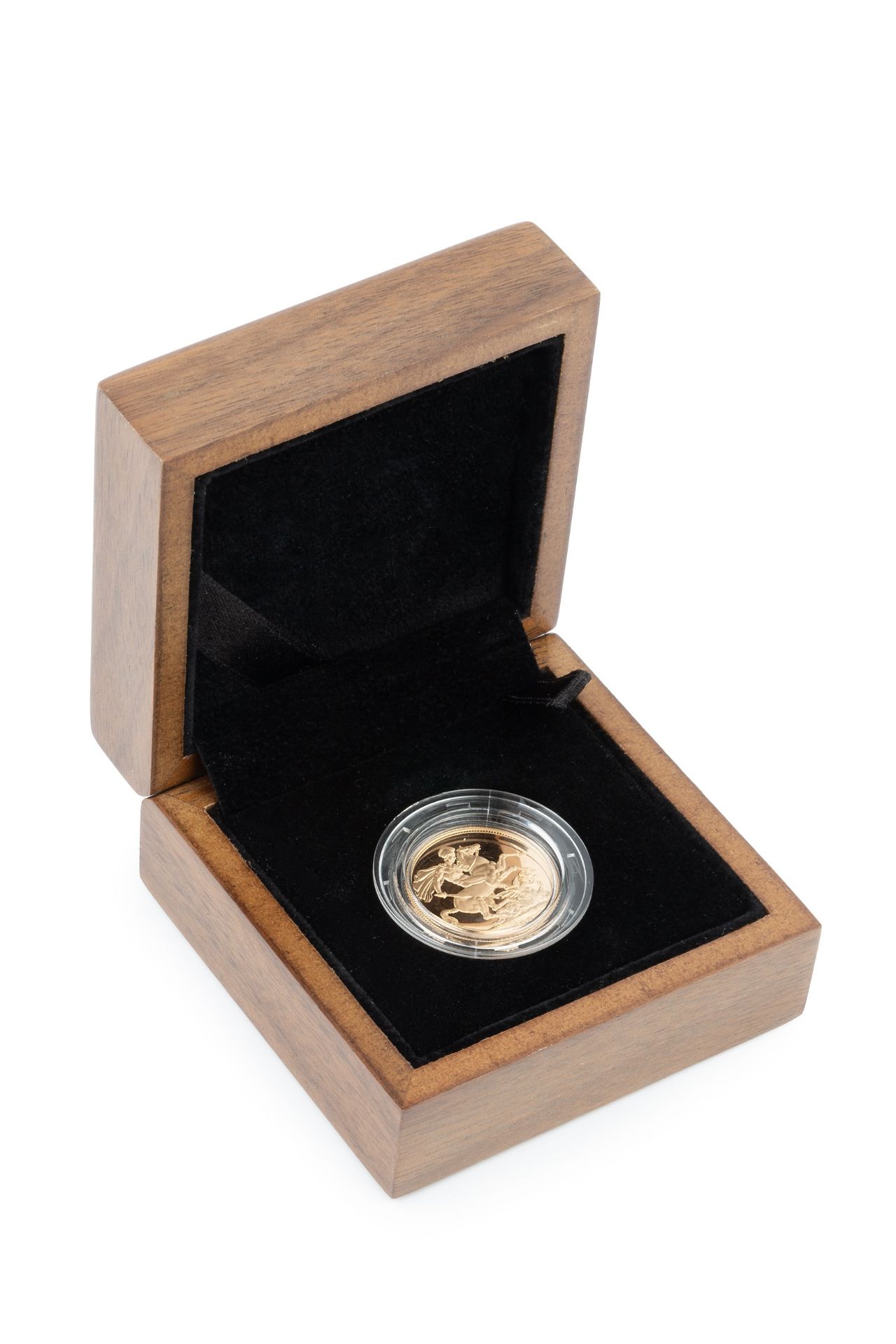 An Elizabeth II sovereign, 2009, in Royal Mint wooden box