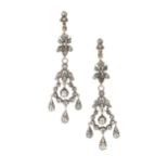 A pair of 19th century diamond chandelier ear clips, each designed with a foliate drop suspending