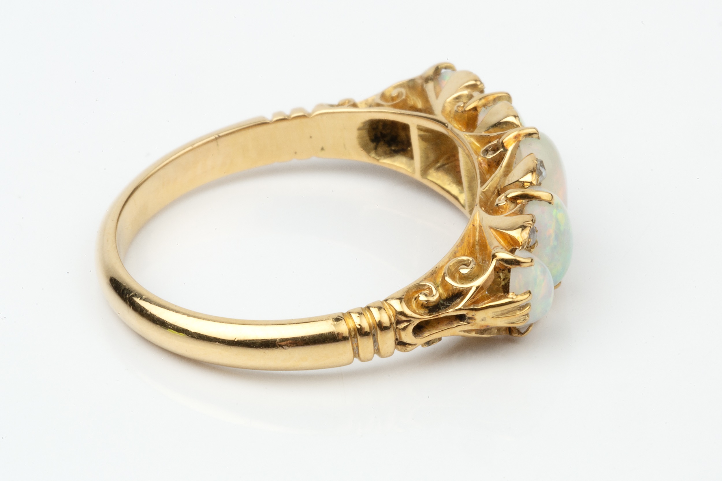 An opal and diamond five stone ring, the graduated cabochon opals with four pairs of rose cut - Image 3 of 4