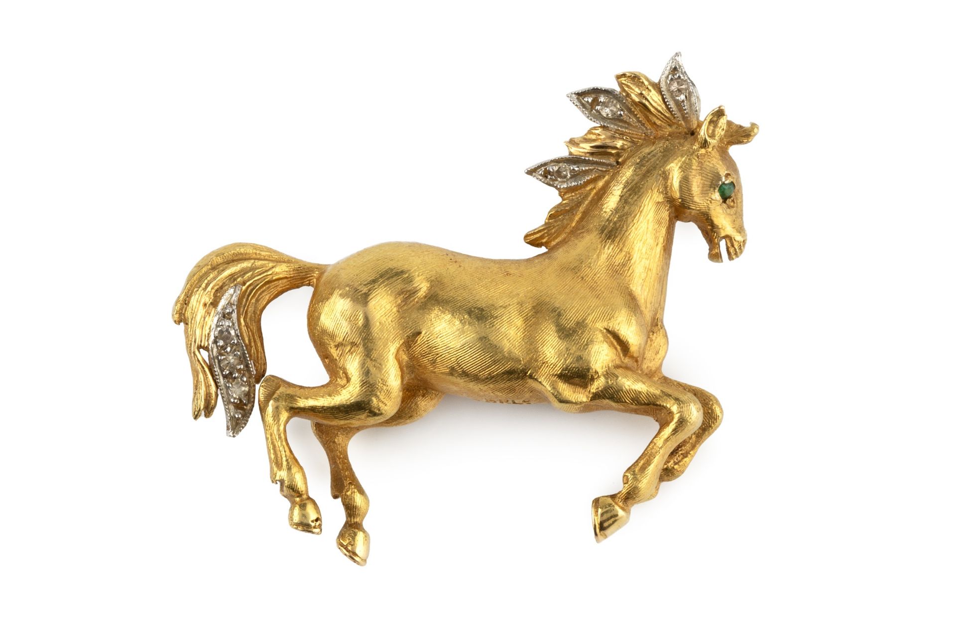 An 18ct gold and diamond set brooch, in the form of a prancing horse, the mane and tail set with