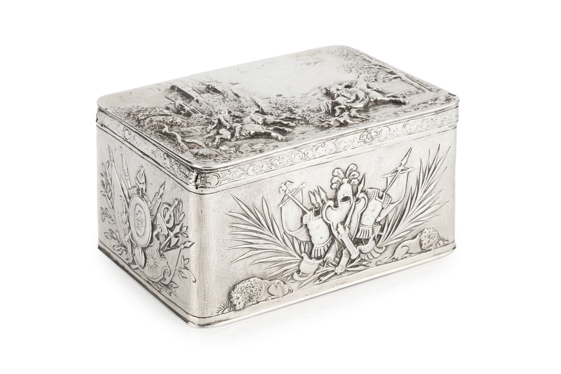 A late 19th century Dutch silver rectangular 'castle top' box, the hinged cover relief decorated
