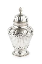 A late Victorian silver tea caddy and cover, of baluster urn form, embossed with repeated stylised