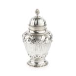 A late Victorian silver tea caddy and cover, of baluster urn form, embossed with repeated stylised