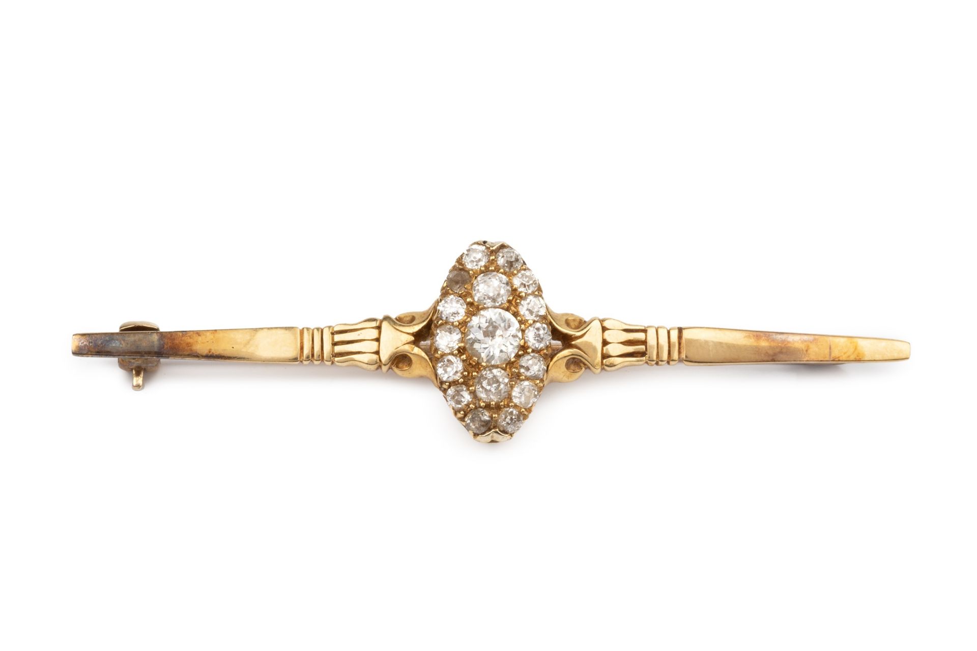 A diamond set bar brooch, the central oval panel set with seventeen old cut stones, the largest