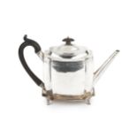 A George III silver teapot on stand, of shaped outline, engraved with wrigglework borders and having