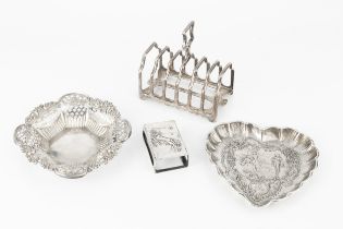 A late Victorian silver seven bar toast rack, of shaped outline, by Dixon & Sons, Sheffield 1897,