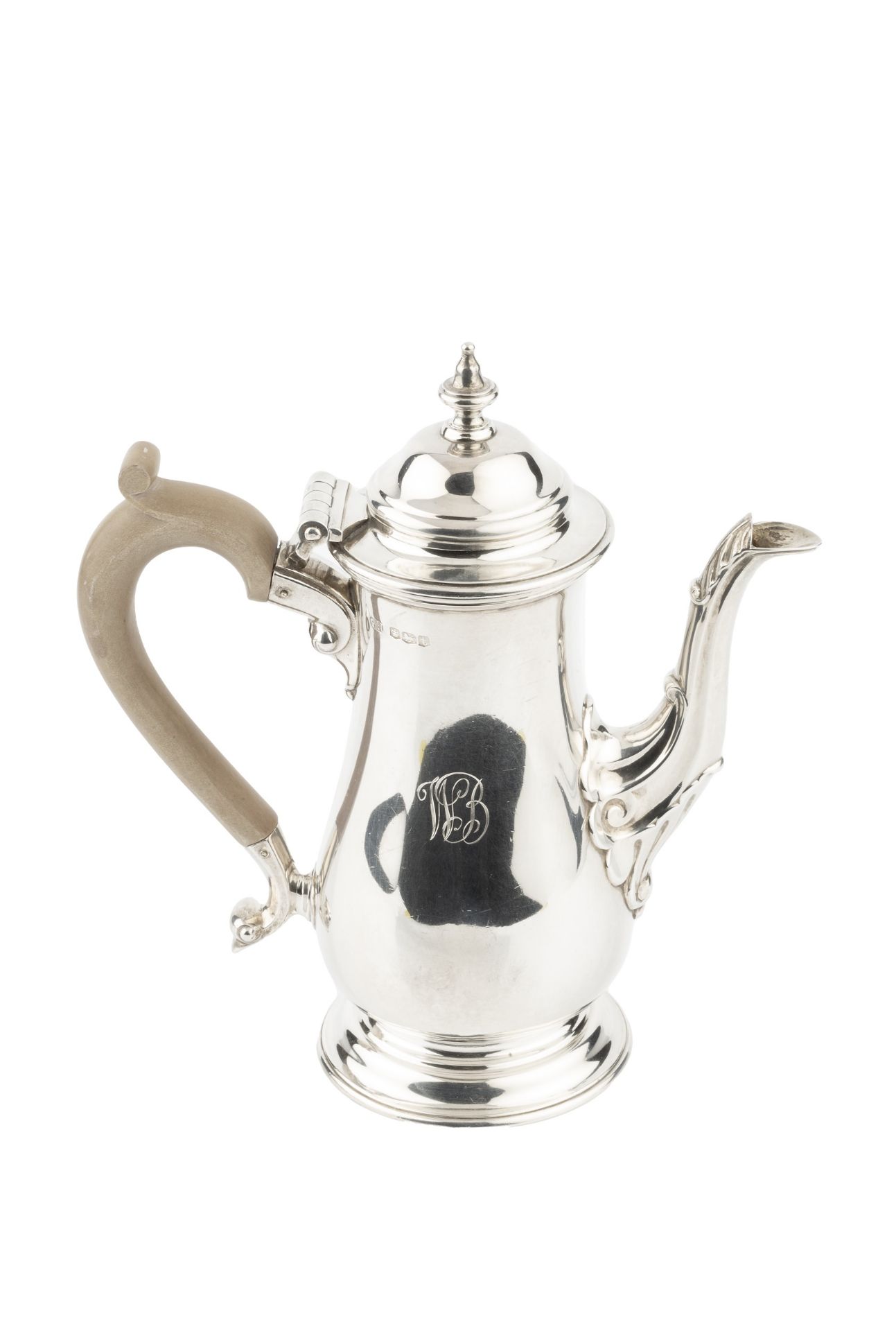 A silver bachelor's coffee pot, of baluster form, with hinged domed cover, scroll and leaf capped