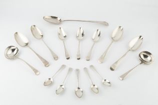 A matched service of Georgian and later silver old English pattern flatware, comprising a gravy