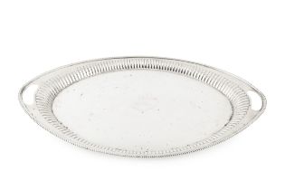 A late Victorian silver oval twin handled tray, with gadrooned and lobed border, and engraved