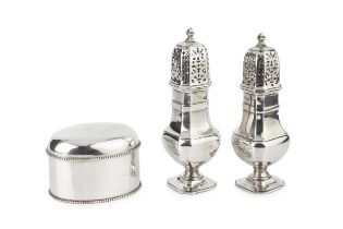 A Dutch silver oval tea caddy, with beaded borders and hinged domed cover, 9.5cm wide, and a pair of