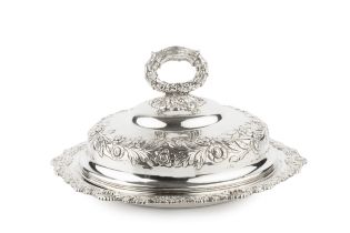 An early Victorian silver muffin dish and cover, with foliate and scallop cast border, the (possibly