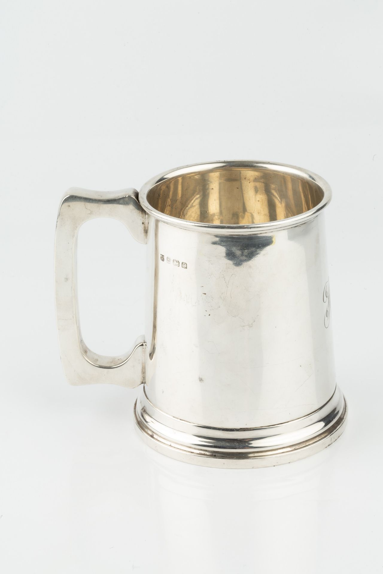 A George V silver pint tankard, of plain design with shaped handle, engraved initials, by William - Image 2 of 2