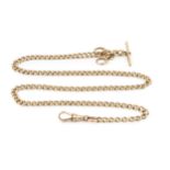 A 9ct gold curb link Albert chain, with T-bar, stamped 9 375, 50cm long Approx 31g. In good