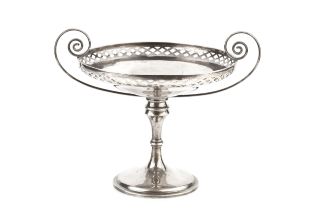 A George V silver twin handle tazza, with diaper-pierced border and scroll handles, on circular