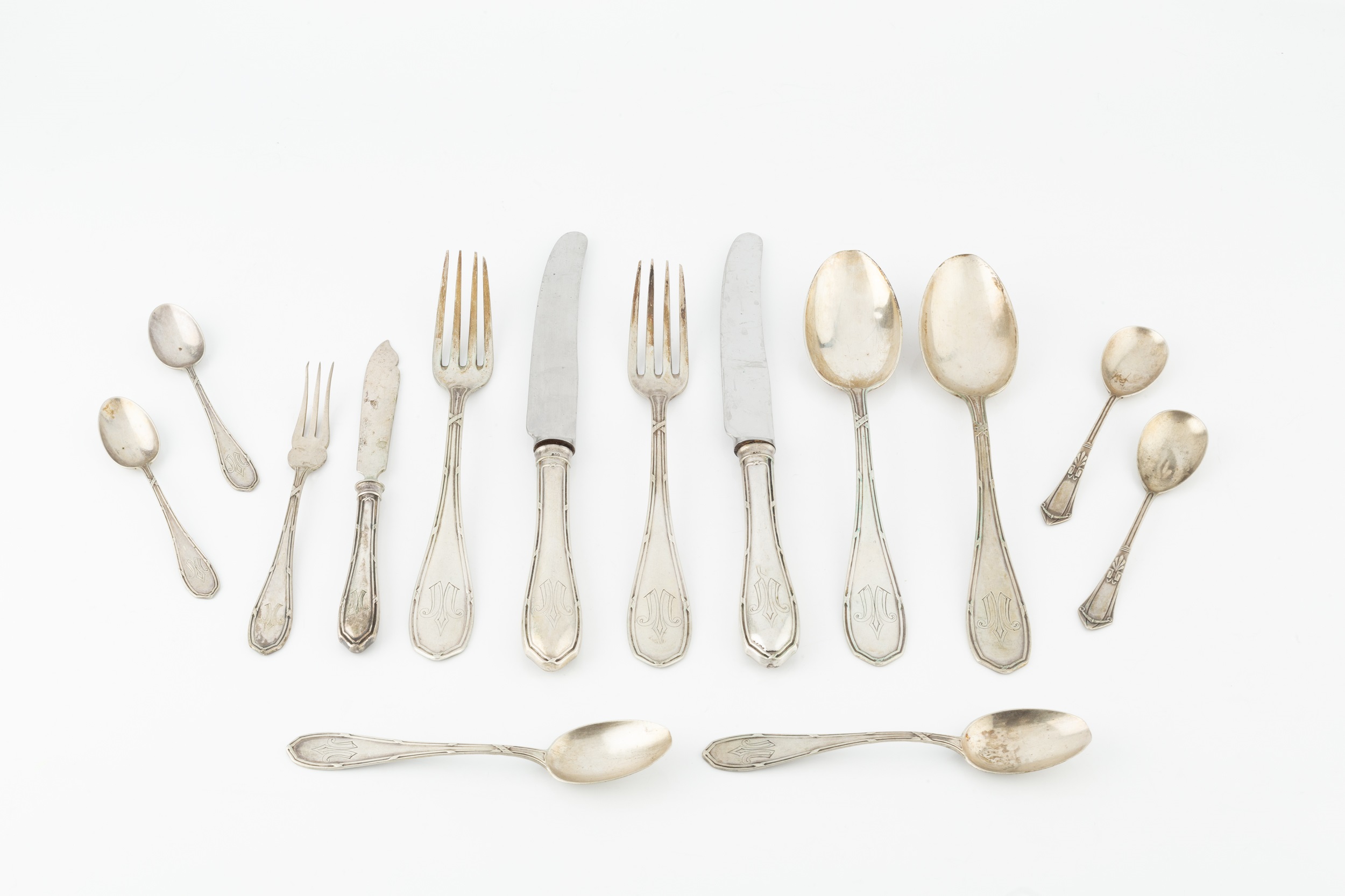 A part service of German silver flatware, comprising 6 table forks, 4 table spoons, 4 dessert forks,