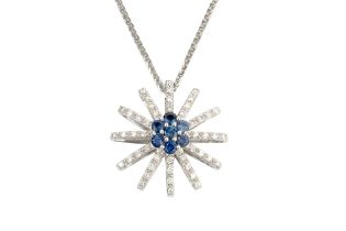An 18k white gold, diamond and sapphire pendant, of flowerhead design, centred with a sapphire