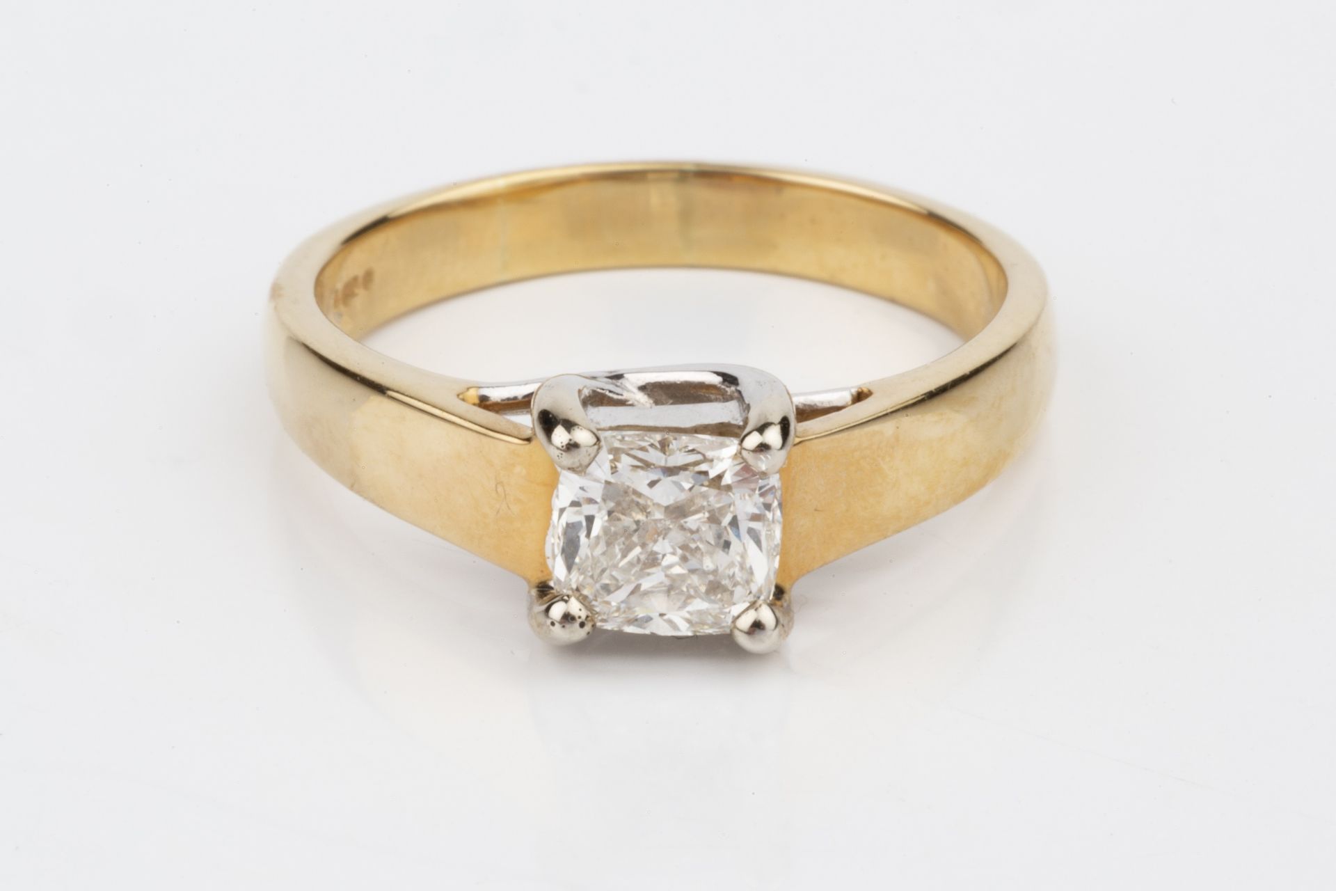 A diamond solitaire ring, the cushion cut stone of approx 1.01ct, claw set to an 18ct yellow gold - Image 2 of 3