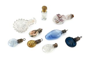 An early 19th century Nailsea glass miniature scent bottle, the white striated body applied to one