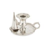 A William IV silver small chamberstick, with shaped borders and conical snuffer by Robert Garrard