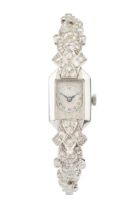 A diamond cocktail watch, with rectangular silvered dial, the 9ct white gold bracelet strap with