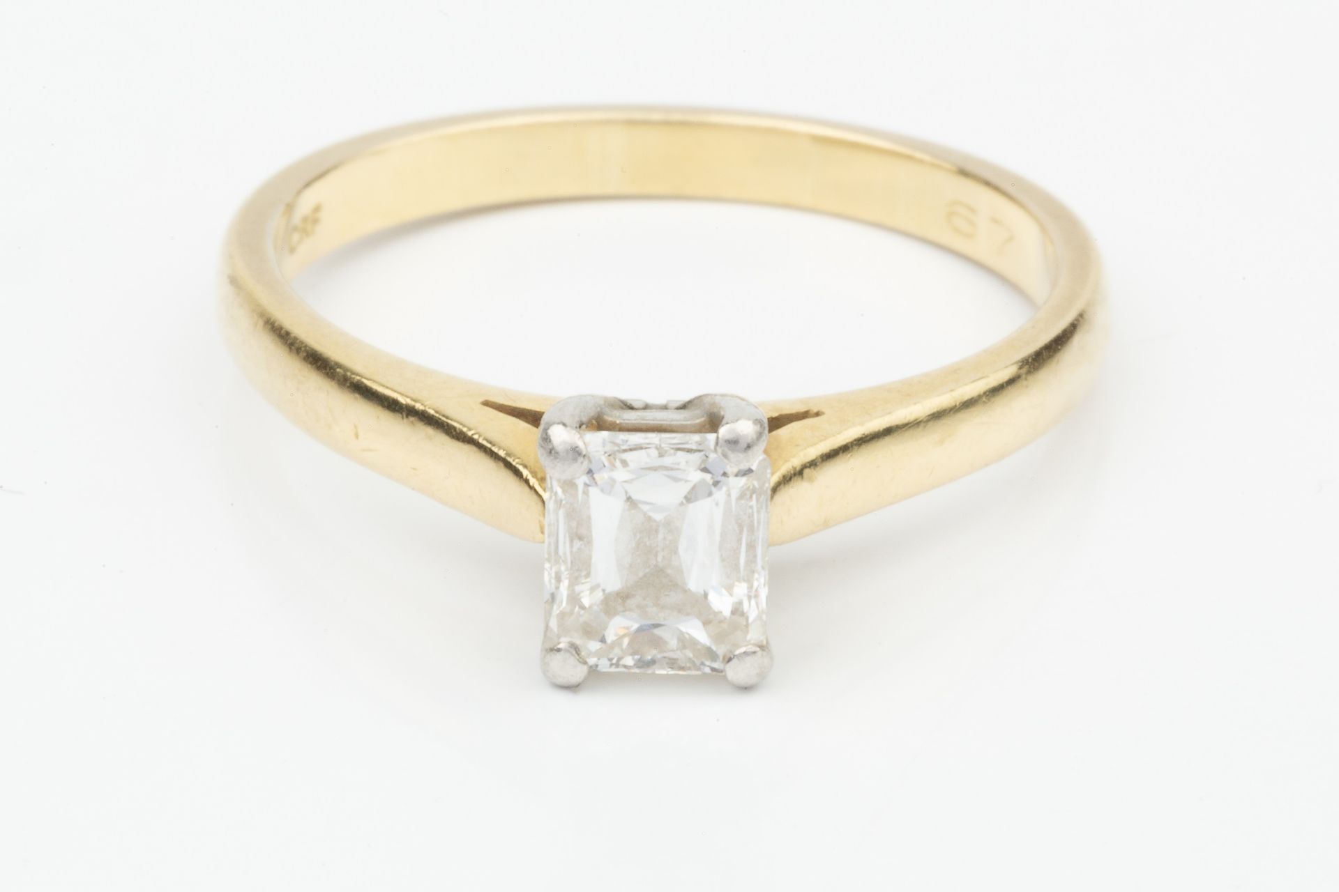 A diamond solitaire ring, the 'crisscut' emerald cut stone approx 0.7ct claw set in platinum to an - Image 3 of 5