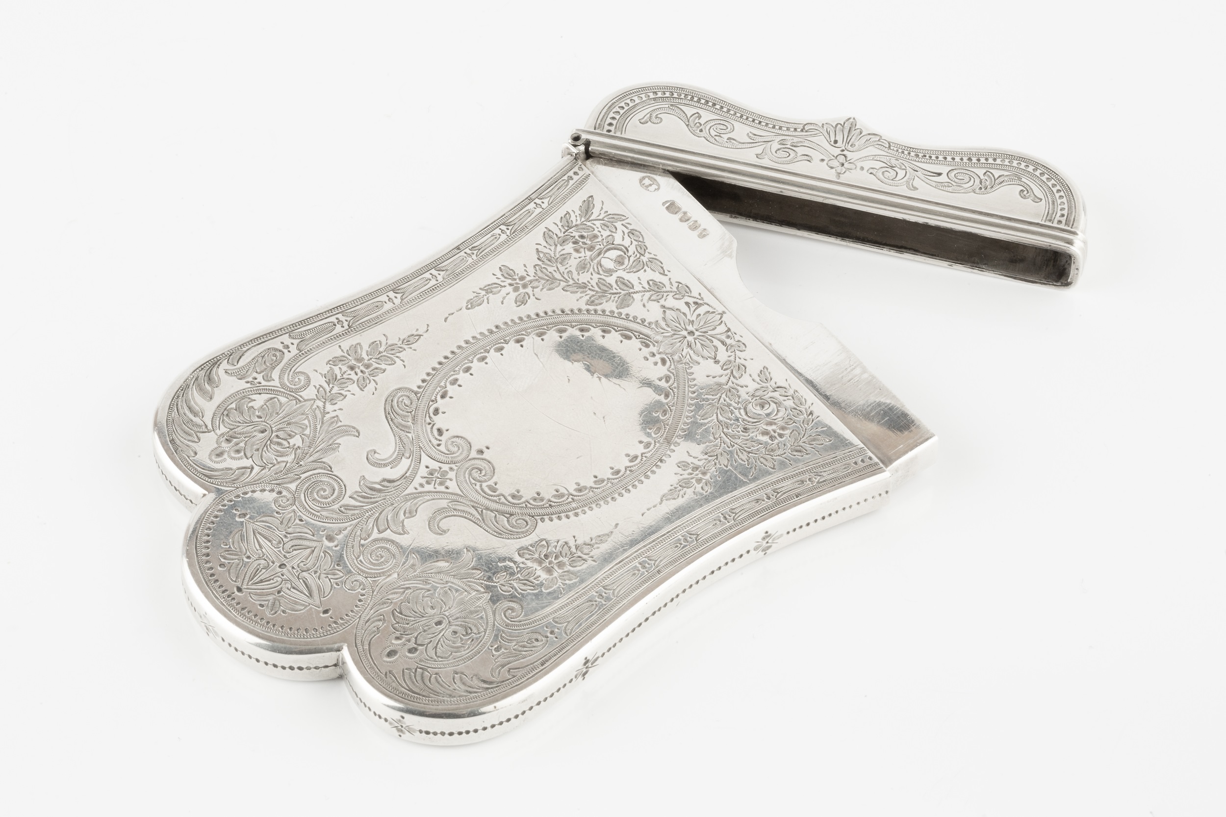 A mid Victorian silver card case, of shaped outline, engraved with flowers and scrolling foliage - Image 2 of 2