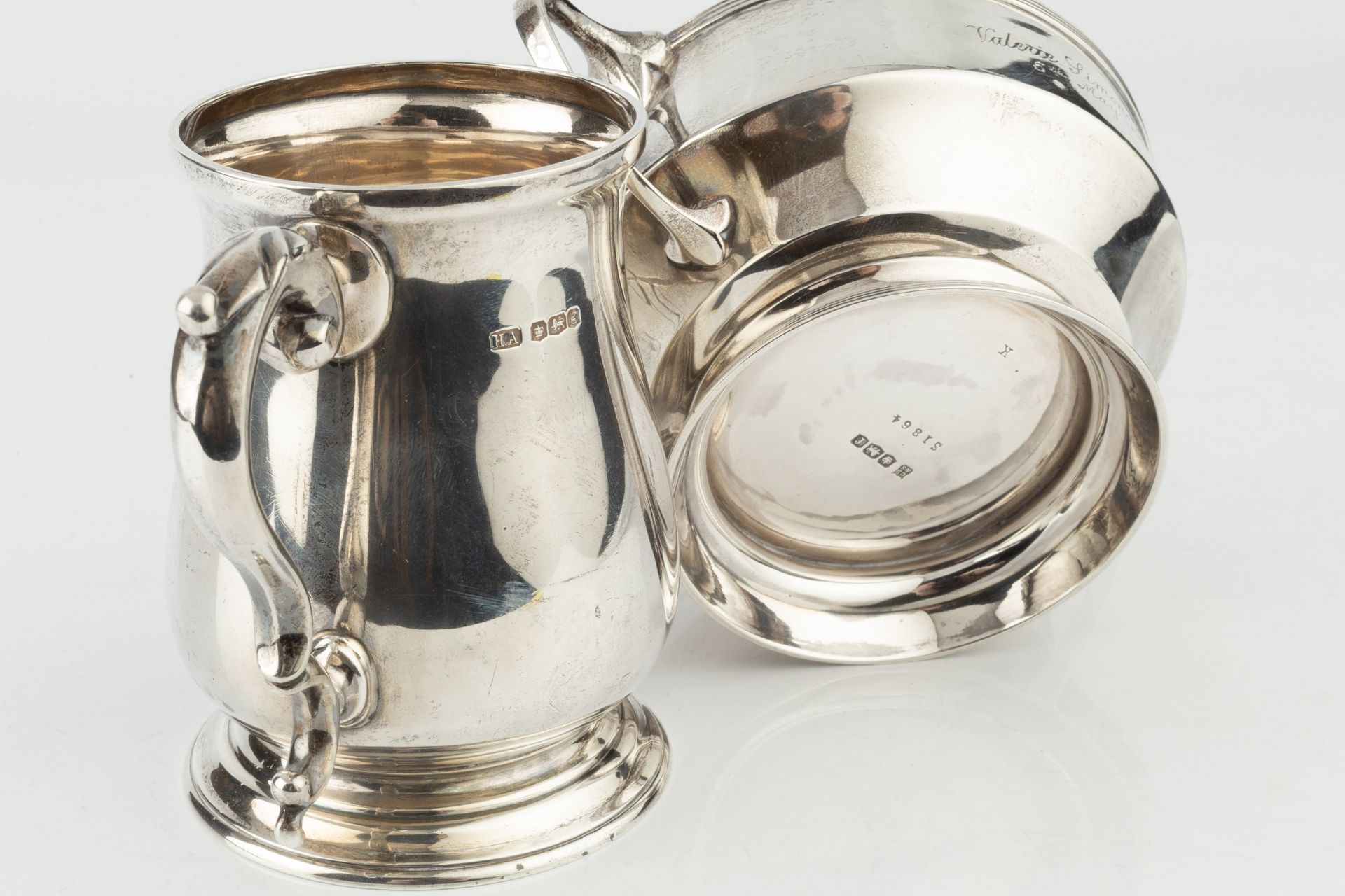 A George V silver baluster mug, with leaf capped scroll handle, by Atkin Bros, Sheffield 1924, 10. - Image 2 of 2