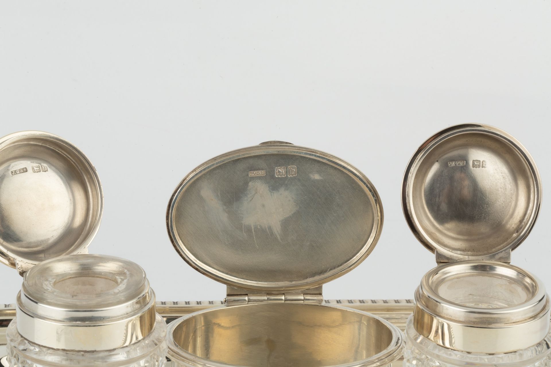 A late Victorian silver inkstand, of rectangular gadrooned form, having central oval hinged lidded - Image 3 of 3