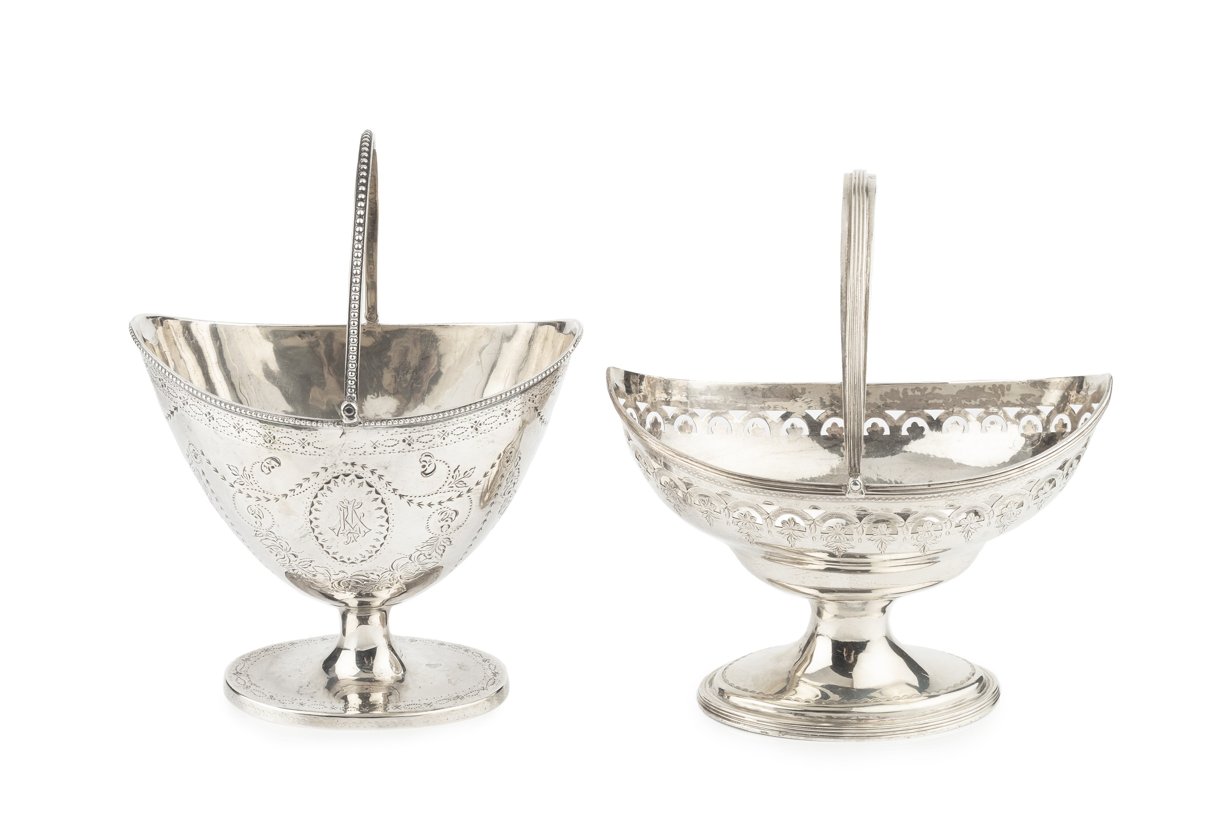 A George III silver swing handled sugar basket, with beaded border and handle, and bright-cut