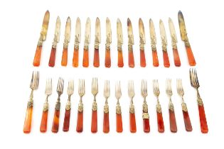 A set of twelve William IV silver-gilt and agate handled dessert knives and forks, with foliate