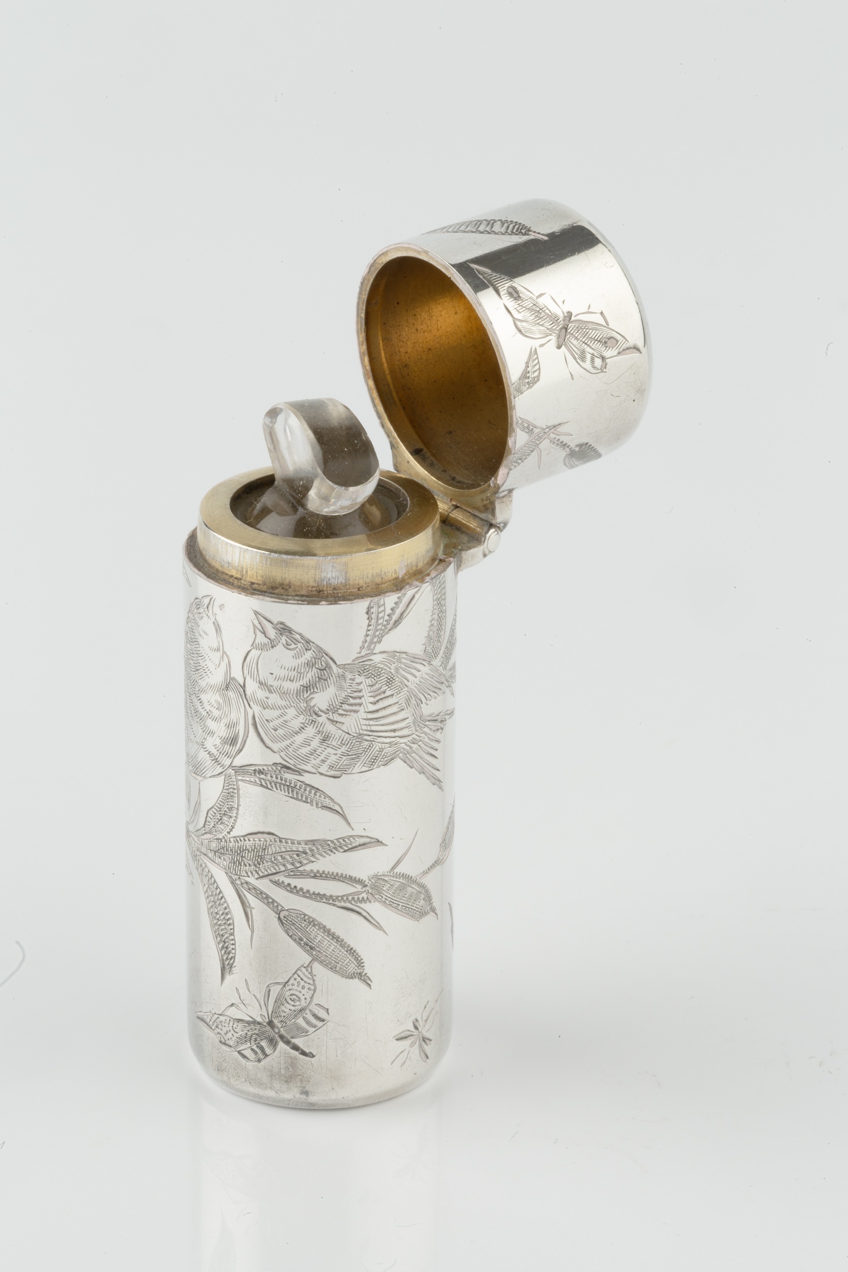 A late Victorian silver cylindrical scent bottle, engraved with songbirds amidst foliage, the hinged - Image 3 of 4